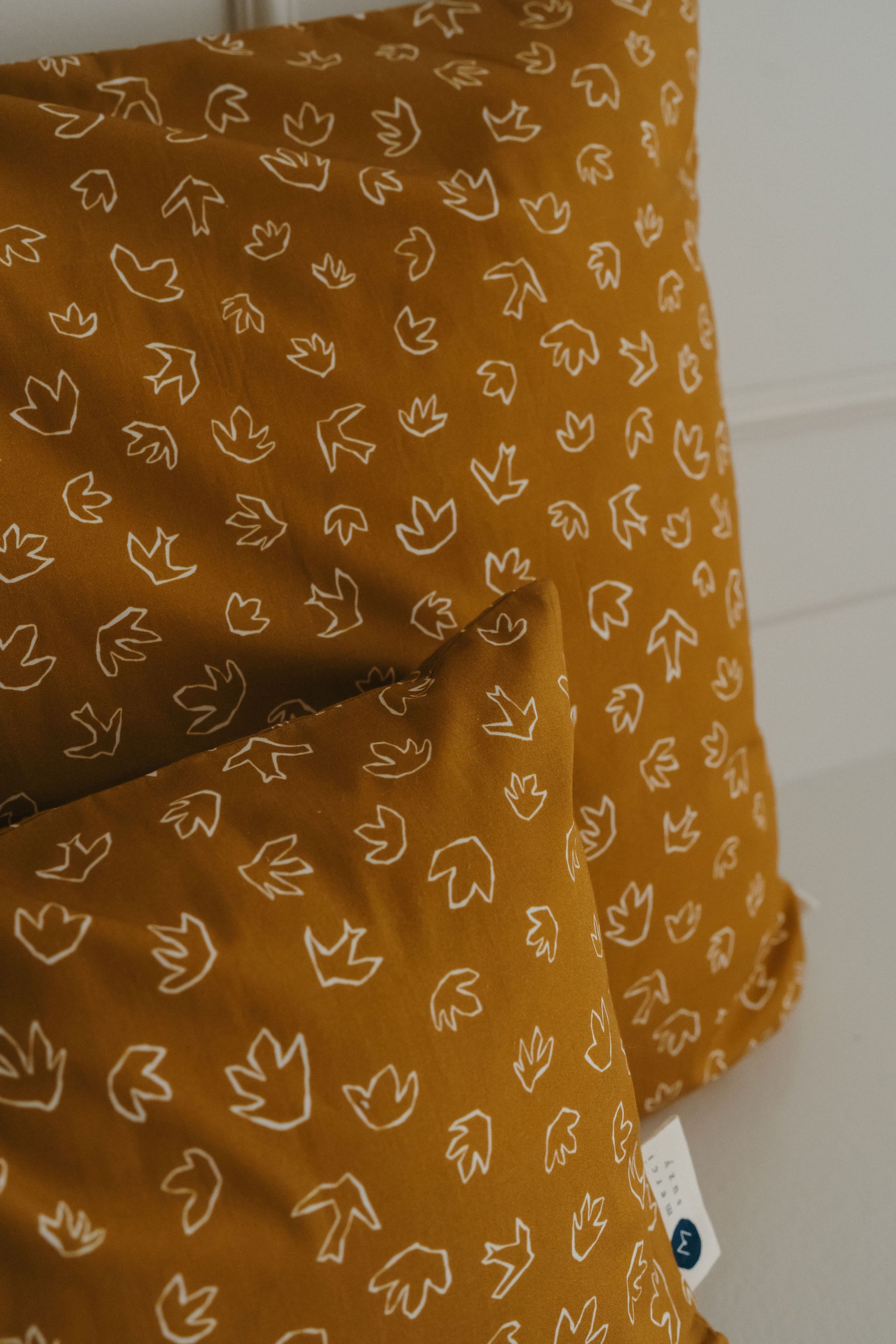 Coussin jaune hirondelle